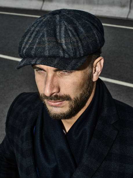 istock Brutal portrait of a man in a cap 992366586