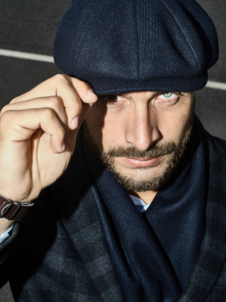 istock Brutal portrait of a man in a cap 992366640