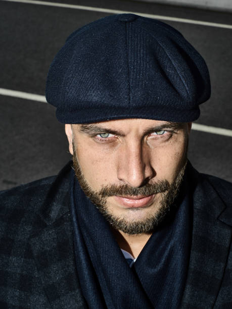 istock Brutal portrait of a man in a cap 992366648