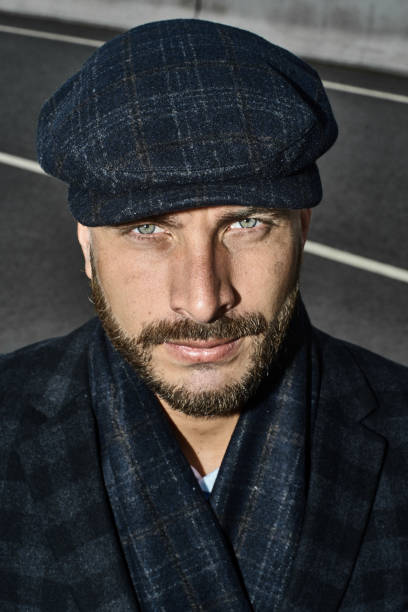 istock Brutal portrait of a man in a cap 992366702
