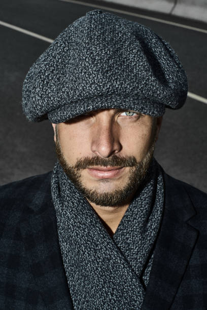 istock Brutal portrait of a man in a cap 992366758