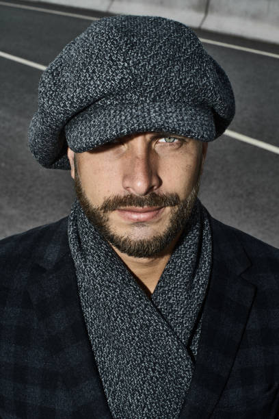 istock Brutal portrait of a man in a cap 992366762