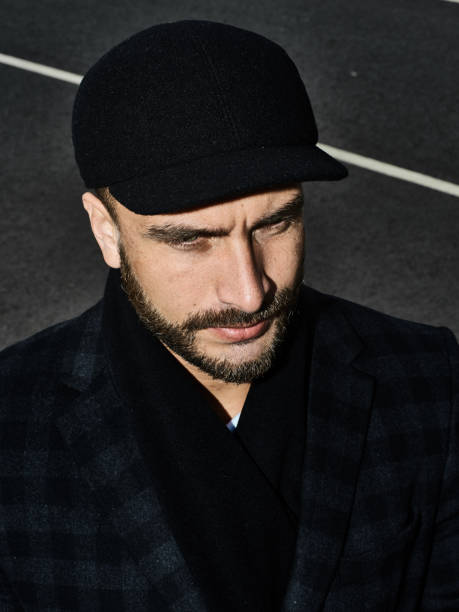 istock Brutal portrait of a man in a cap 992366770