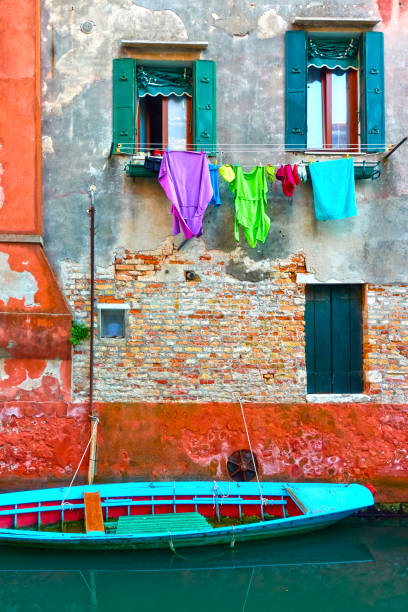 istock Old house by canal in Venice 992383308