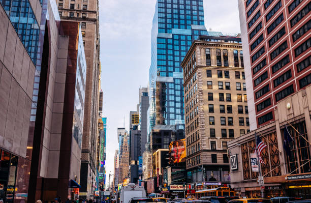istock Busy streets of Times Square, NYC in evening 992383622