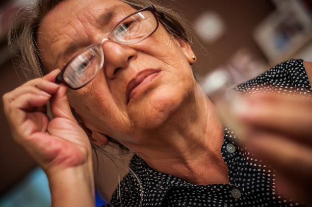 istock Woman reads a drug instruction 992386160