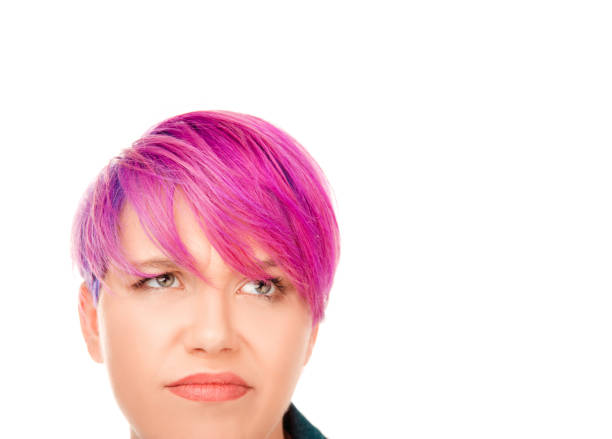 istock woman model looks pensively up aside skeptical 992416908