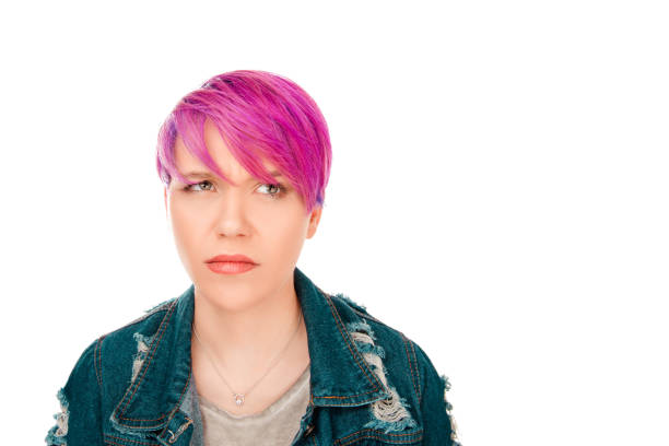 istock young woman employee, customer, thinking looking up to side 992416912