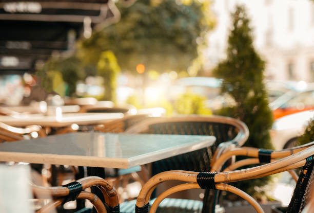 istock Wood table top and blurred restaurant interior background 992420968