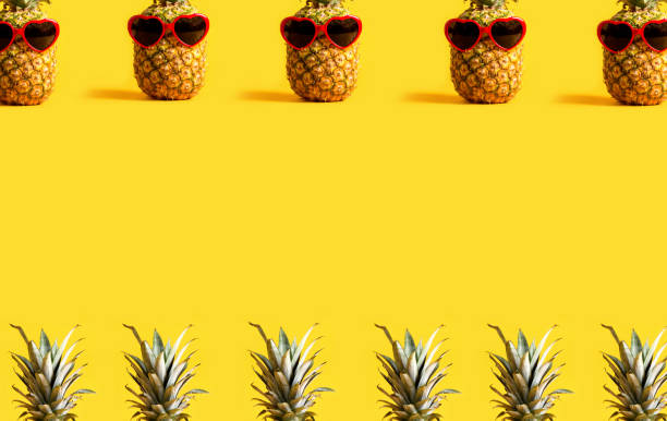 istock Series of pineapples wearing sunglasses 992428982