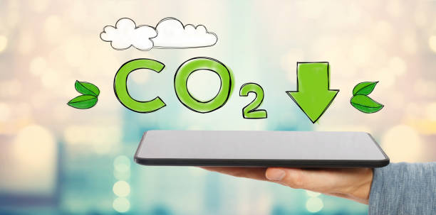 Reduce CO2 with man holding a tablet Reduce CO2 with man holding a tablet computer co2 drawings stock pictures, royalty-free photos & images