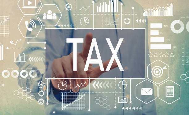 istock Tax with businessman 992429412