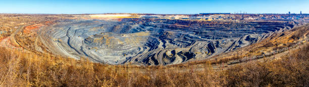 istock Environmental pollution problems. World's largest open pit iron ore mine near the town of Gubkin, Russia 992429552