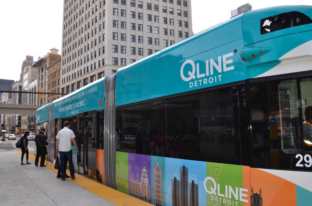 Detroit QLine DETROIT, MI / USA - OCTOBER 21, 2017:  Detroit’s QLine, shown here, runs along Woodward Avenue in downtown Detroit. woodward stock pictures, royalty-free photos & images