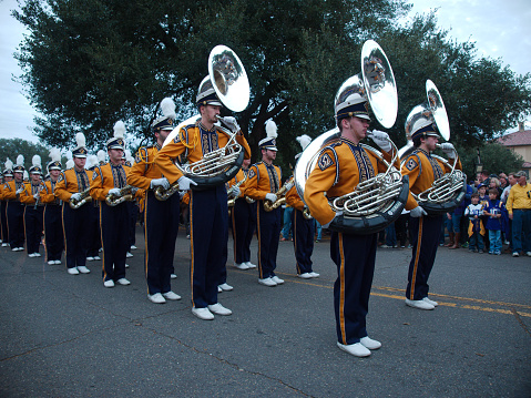 Baton Rouge, Louisiana, USA - 2017: The Louisiana State University band performs while marching at the university campus before a football game.