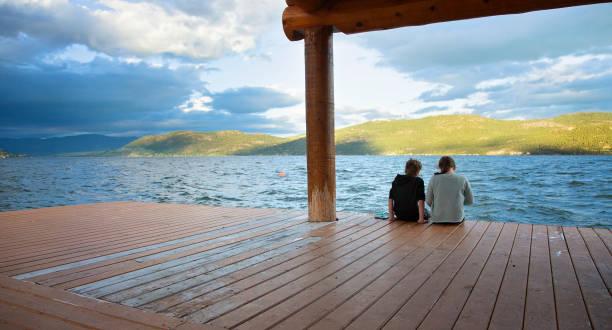 istock Brother and Sister Time on the Dock 992481734