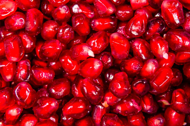 istock Texture of the garnet seeds for the background 992560304