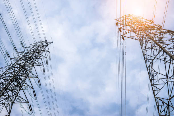 istock Electricity concept. Close up high voltage power lines station. 992568224