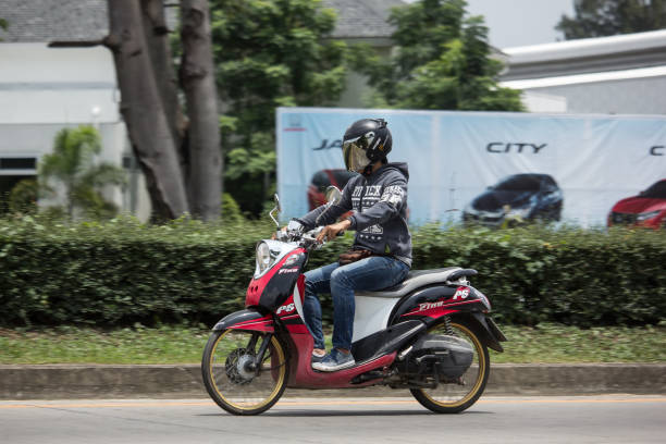 Chiangmai, Thailand - June 19, 2018: Private Yamaha Fino Motorcycle. Photo at road no.121 about 8 km from downtown Chiangmai, thailand.