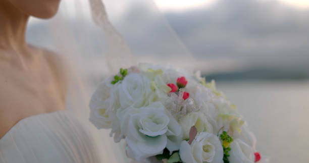 Wedding ceremony backdrop of string lights and flowers