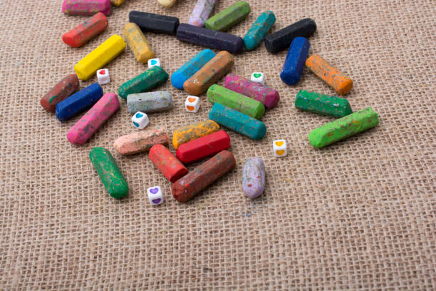 istock Crayons of various color on a canvas 992583856