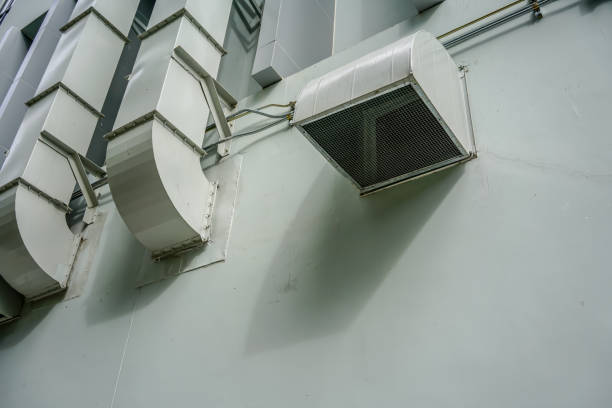 istock Air ventilation pipes on wall outside the building. 992589368