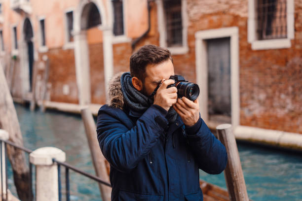 istock Tourist taking photos in Venice 992598044
