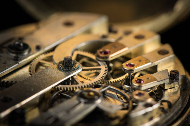 istock Clockwork of an old open pocket watch 992607094