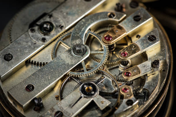 istock Clockwork of an old open pocket watch 992607218