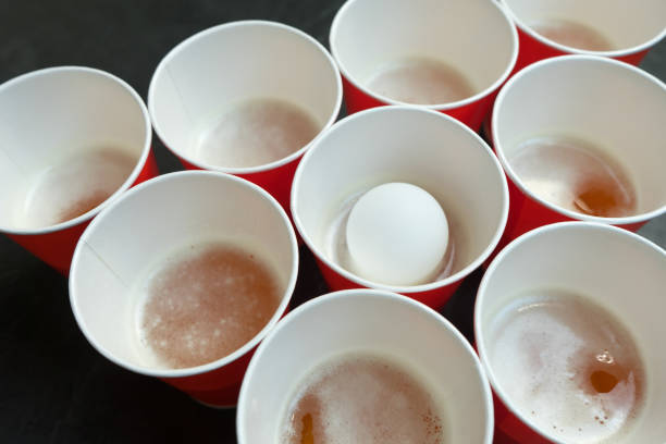 istock Beer pong. Popular game at parties. Place for your text. 992620900