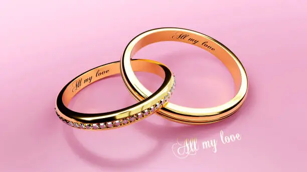 Expensive golden wedding rings with engraved words, 3d illustration