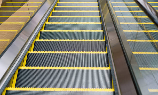istock Escalator in modern shopping mall 992634144