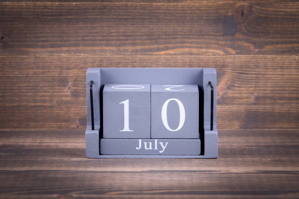 istock 10 July. Wooden, square calendar 992634198