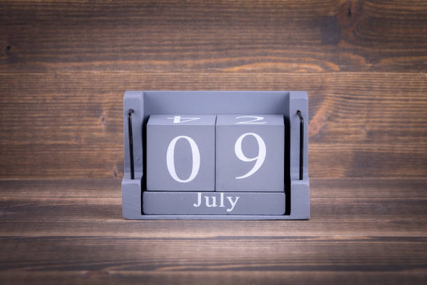 istock 9 July Wooden, square calendar 992634482