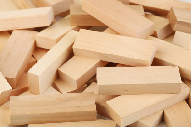 istock Heap of wooden blocks tower game 992657550