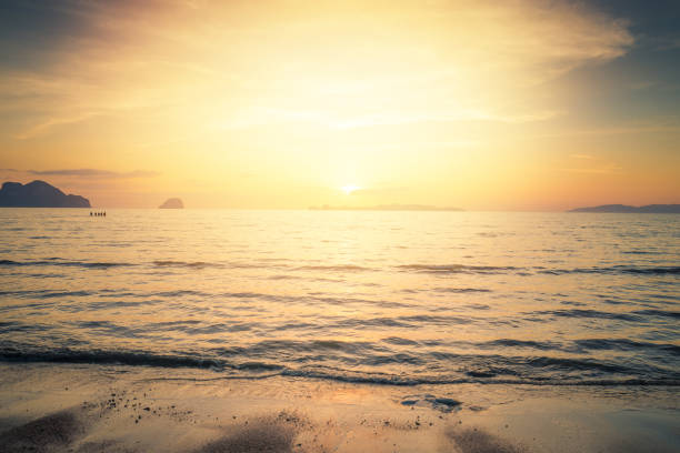 Scenic View Of Sea Against Orange Sky