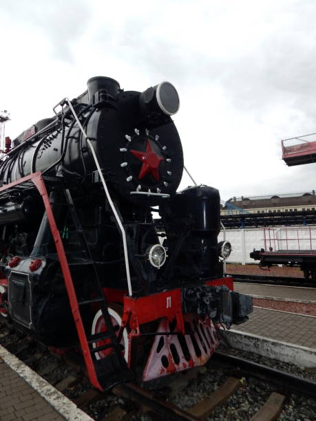 istock Railway locomotive, wagons in the train 992667602