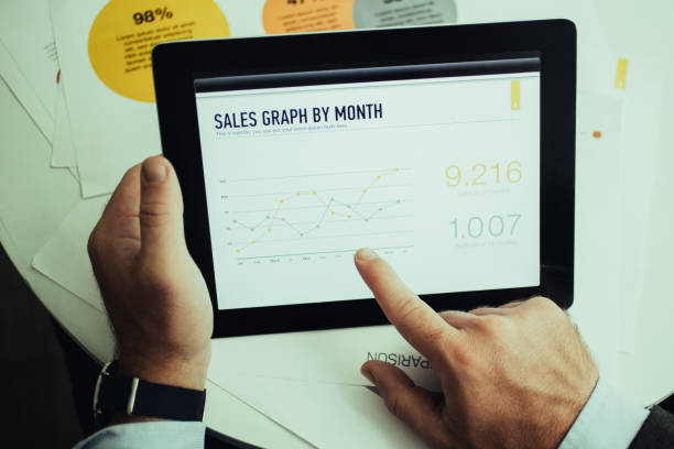 istock Close-up of manager working with report data 992696408