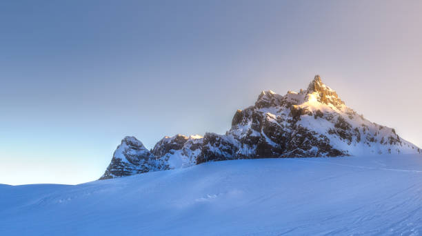 istock Mountain and ridge of Dolomiti covered with snow 992708698