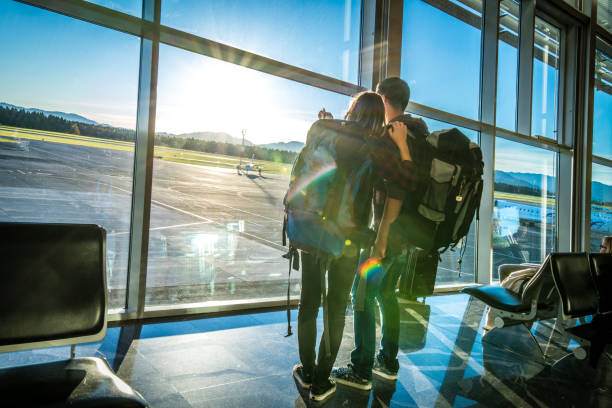 istock Business people in departure lounge 992709968