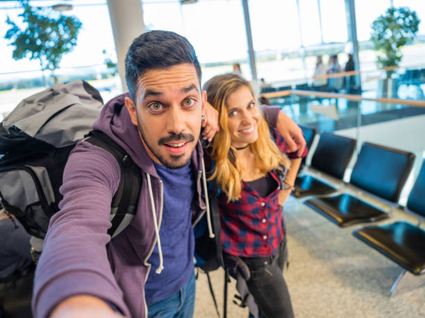 Business people in departure lounge