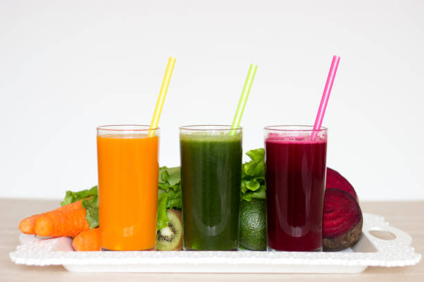 istock Vegetable smoothies detox - Carrot, beet and green salad. 992710118