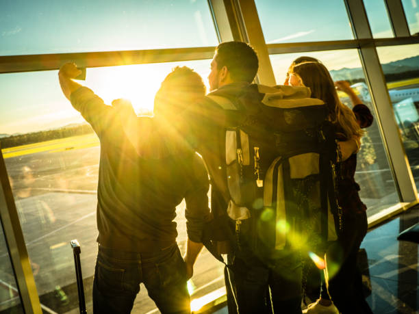 istock Business people in departure lounge 992710156