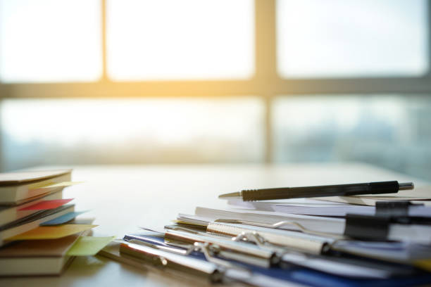istock Businessman working reading documents graph financial to job succes Analyze document plans 992713338