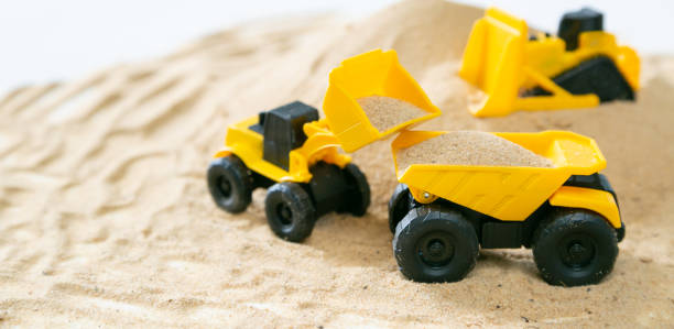 istock Construction concept - toy model machinery on sald 992713838