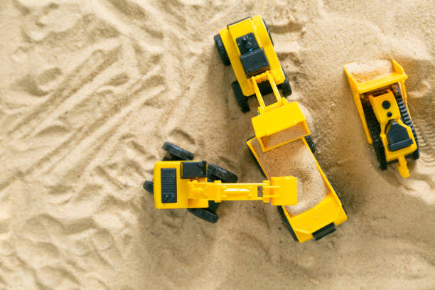 istock Construction concept - toy model machinery on sald 992713916