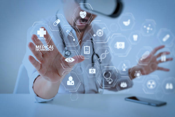 istock smart doctor wearing virtual reality goggles in modern office with mobile phone using with VR headset 992713994