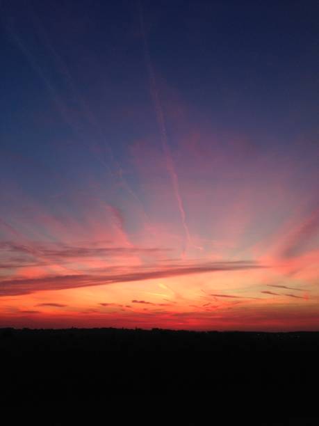 istock sundown dusk sunset vibrant sky rolling hills countryside rural scenic view 992722656