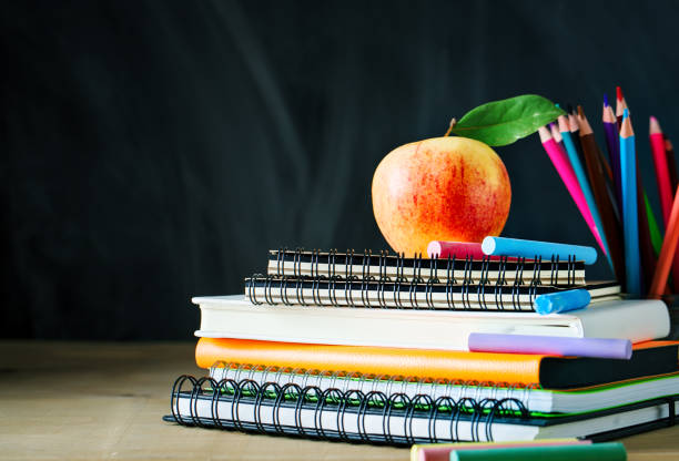 istock Back to school background with school supplies 992723632