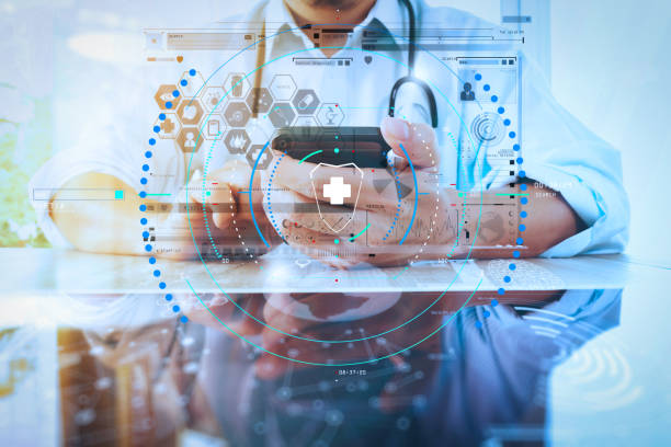 istock Medicine doctor hand working with modern smart phone with computer interface as medical network concept 992725934
